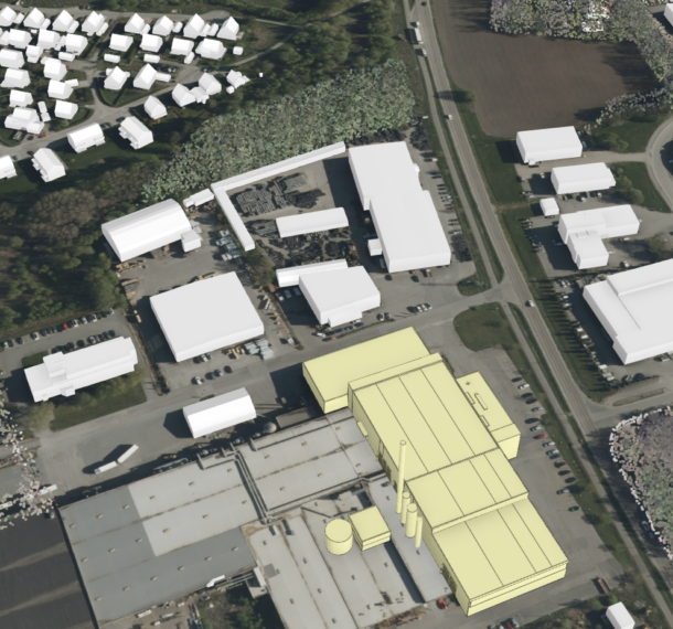 3d-modell av bygningen sett fra luften. Anlegget ligger i et industriområde og nord i bildet ser man boliger.